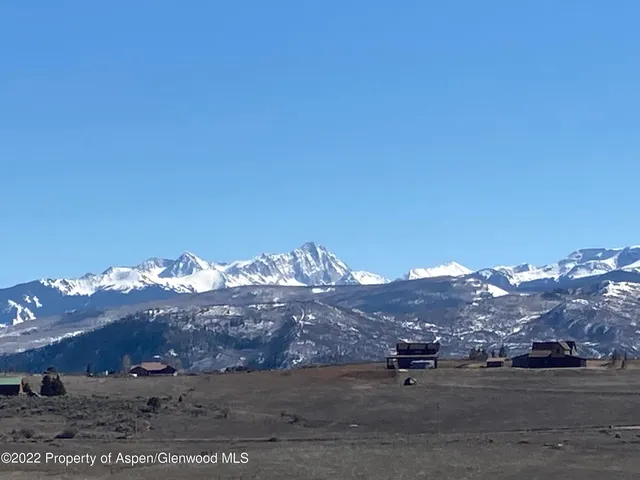 a view of lake and mountain