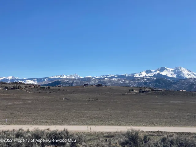 a view of a lake with a mountain in the background