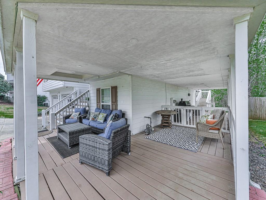 68 Arbor Hills Road South Talking Rock, GA 30175 - Photo 20 of 36 a outdoor space with furniture and wooden floor