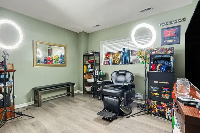 a view of workspace with gym equipment