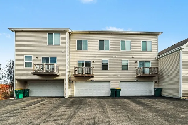 a view of a house with garage