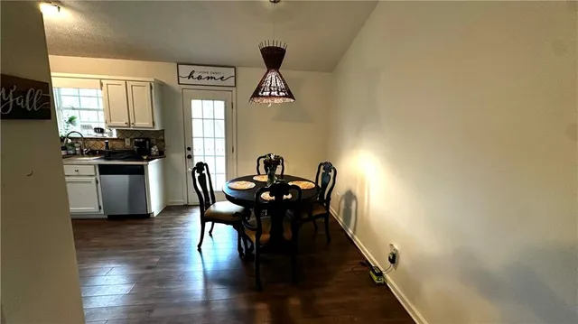 a view of balcony with wooden floor