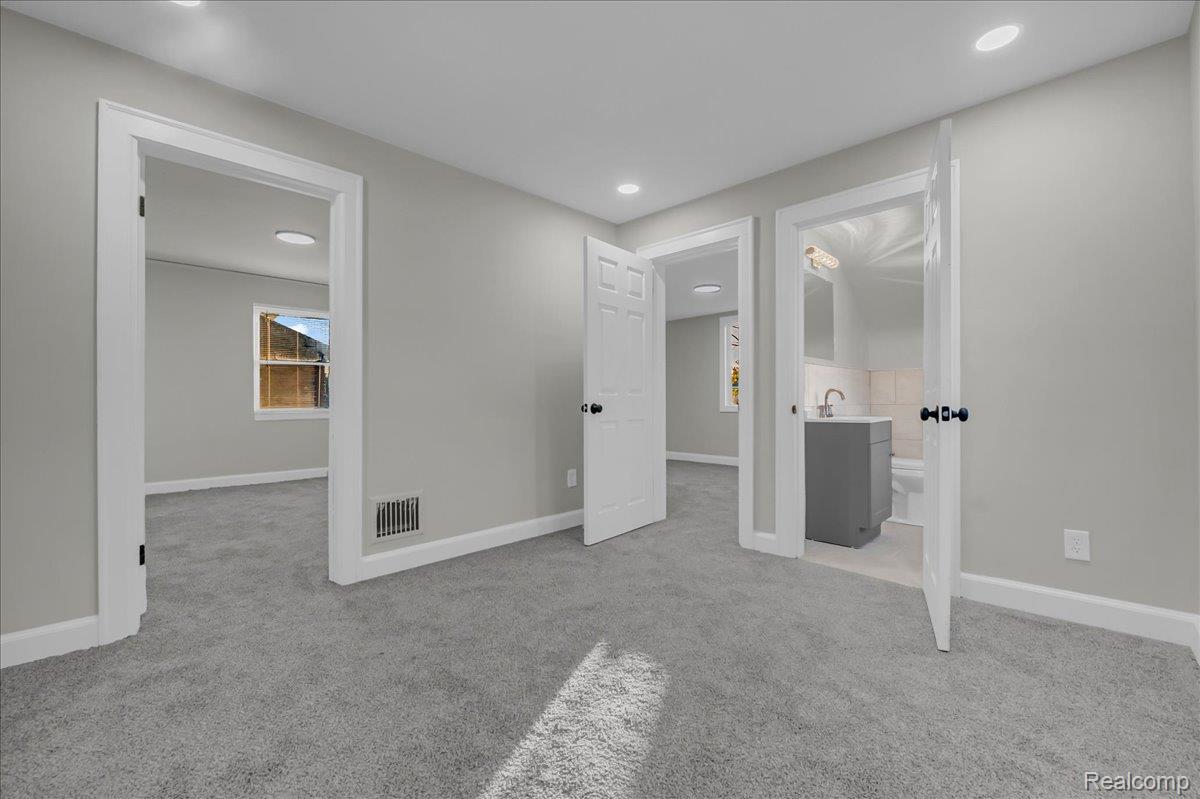 16717 Fielding Street Detroit, MI 48219 - Photo 32 of 46 Unfurnished bedroom featuring light colored carpet and recessed lighting