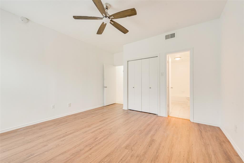 14277 Preston Road, Unit 823 Dallas, TX 75254 - Photo 14 of 25 wooden floor in an empty room