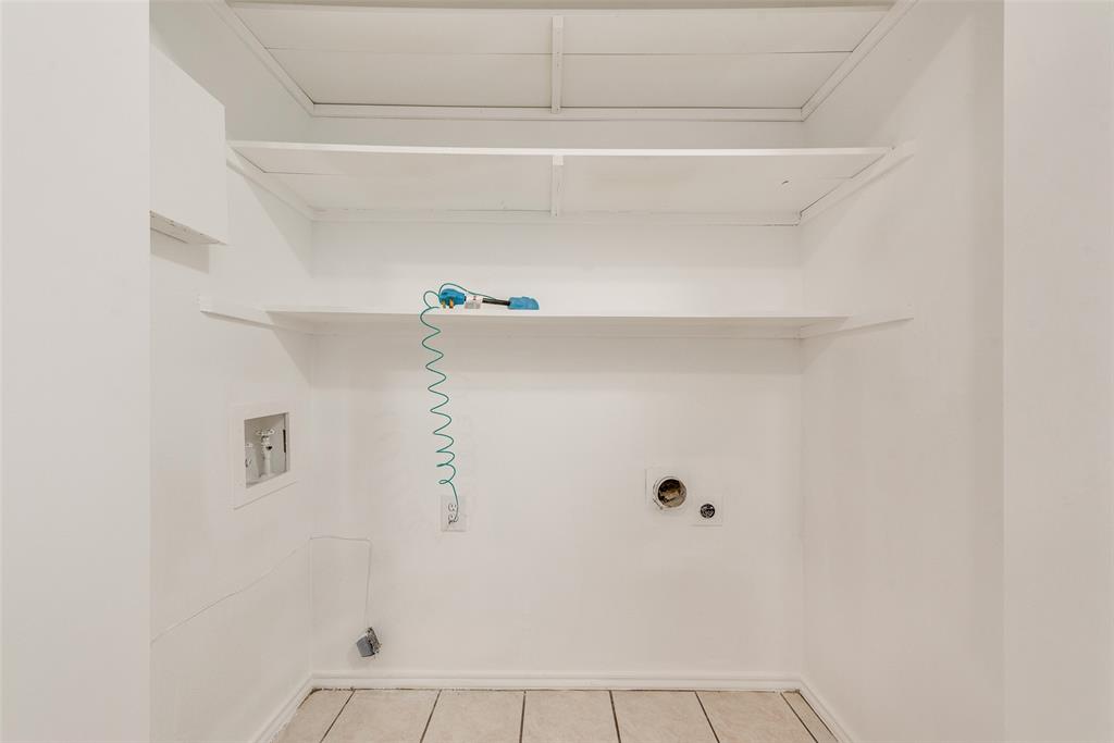 14277 Preston Road, Unit 823 Dallas, TX 75254 - Photo 16 of 25 a view of small space with racks on the wall