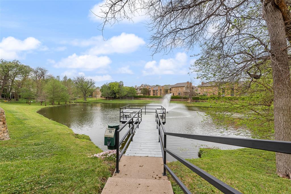 14277 Preston Road, Unit 823 Dallas, TX 75254 - Photo 21 of 25 a view of a lake with a floor to a building