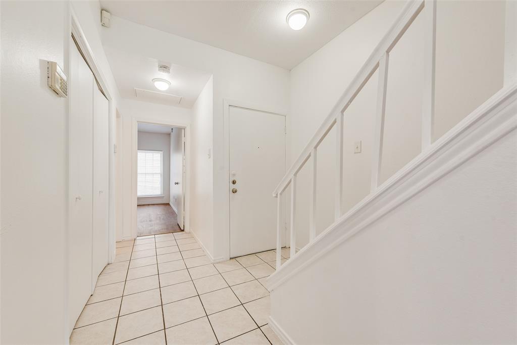 14277 Preston Road, Unit 823 Dallas, TX 75254 - Photo 3 of 25 a view of an entryway with stairs