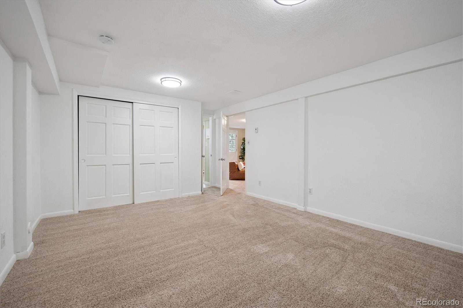 9189 Fallen Rock Road Conifer, CO 80433 - Photo 26 of 47 a view of an empty room