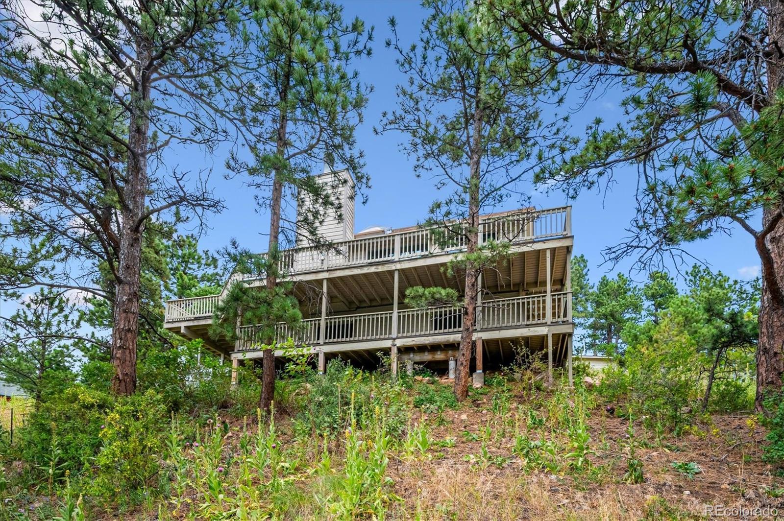 9189 Fallen Rock Road Conifer, CO 80433 - Photo 34 of 47 a view of a backyard