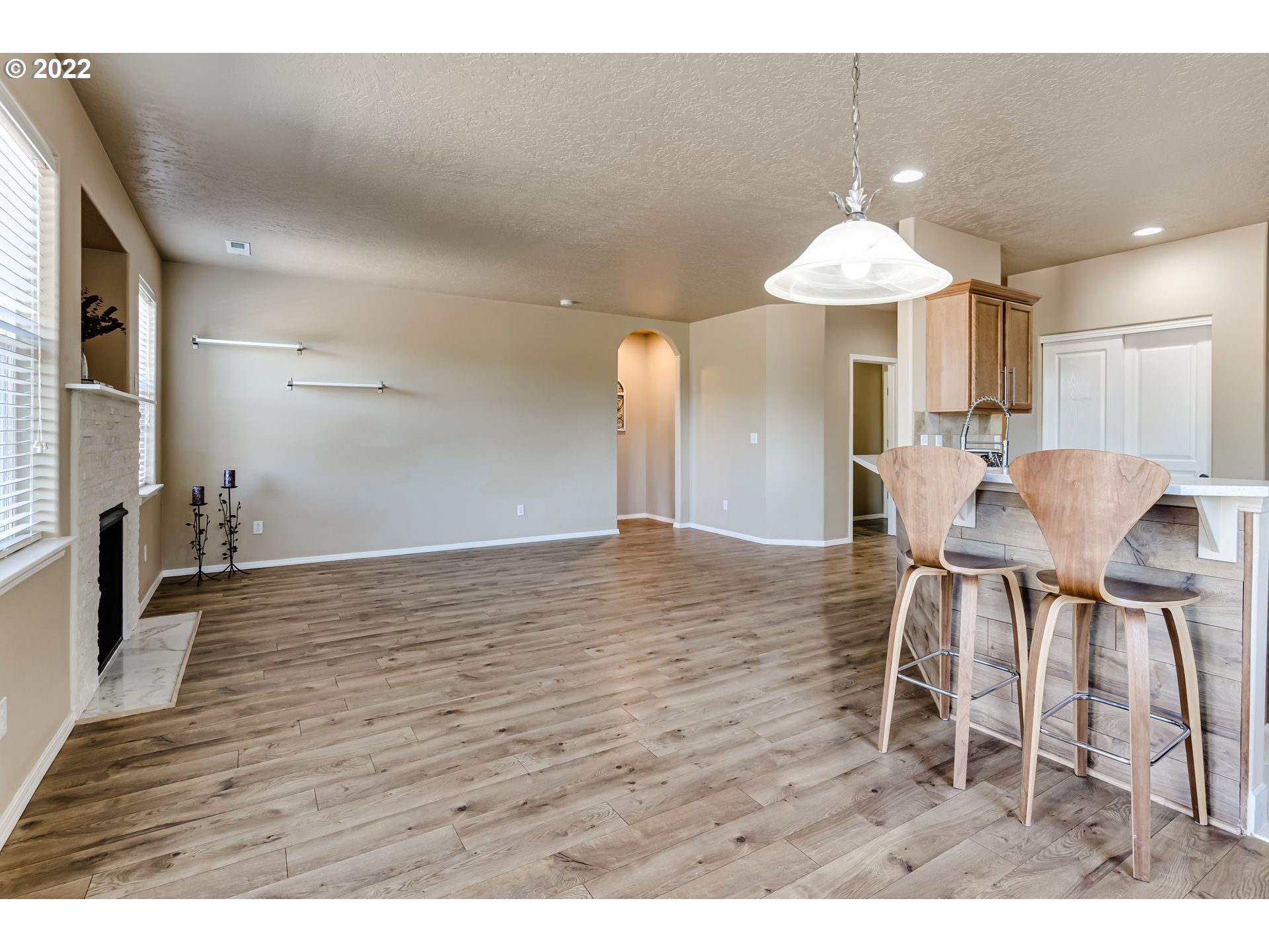 507 South 48th Place Springfield, OR 97478 - Photo 13 of 31 a view of a dining room with furniture and wooden floor
