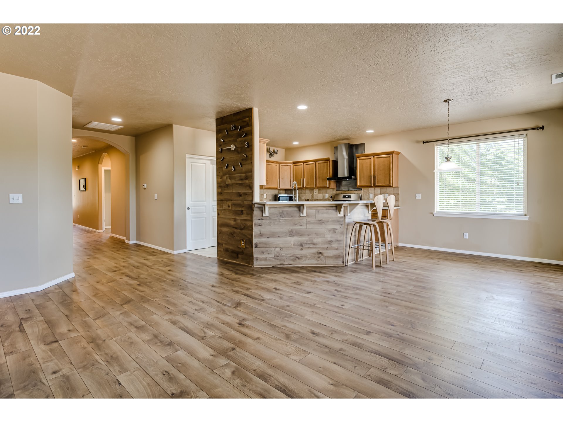 507 South 48th Place Springfield, OR 97478 - Photo 8 of 31 a view of kitchen with furniture and wooden floor