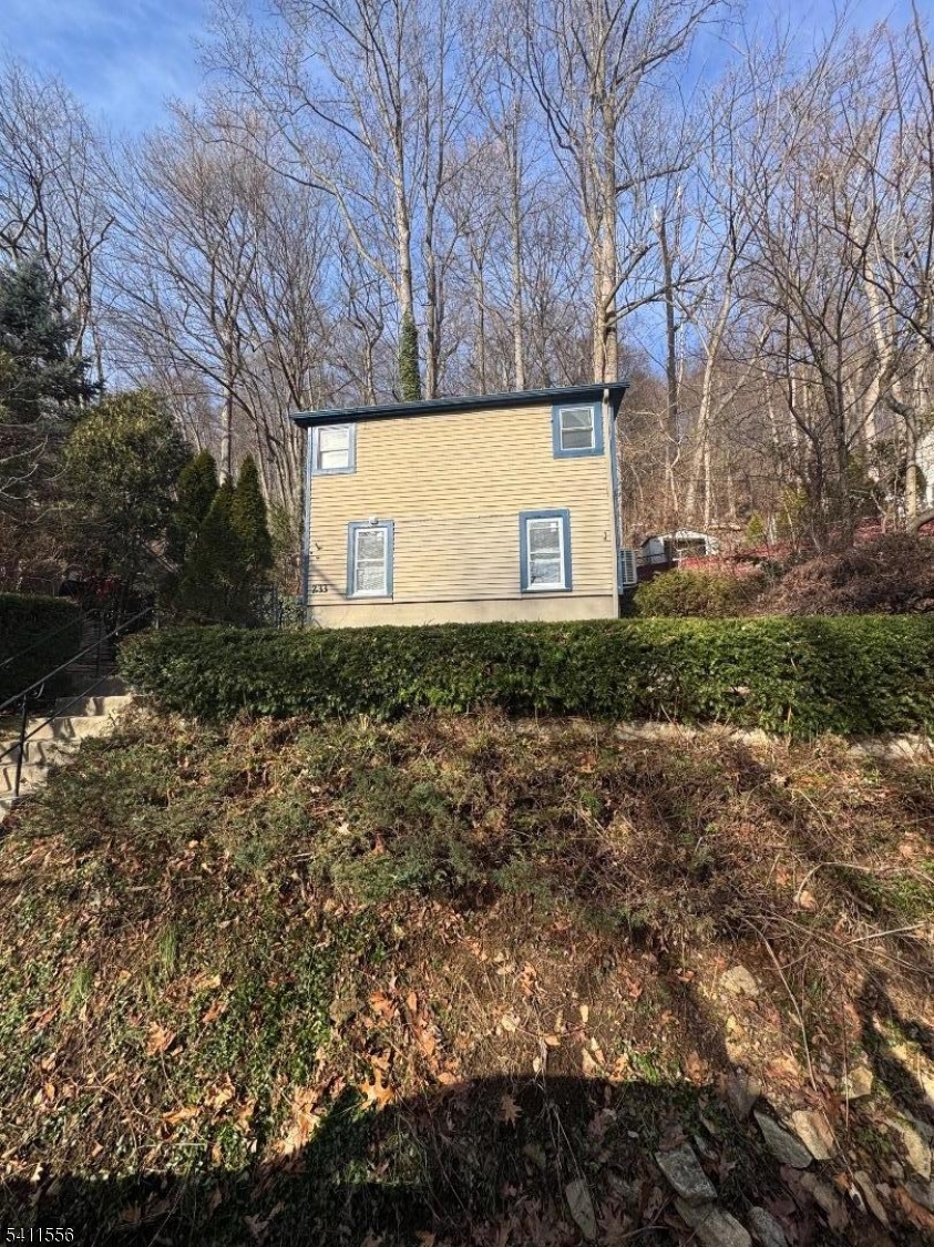 233 Franklin Road Denville, NJ 07834 - Photo 1 of 8 a view of a backyard