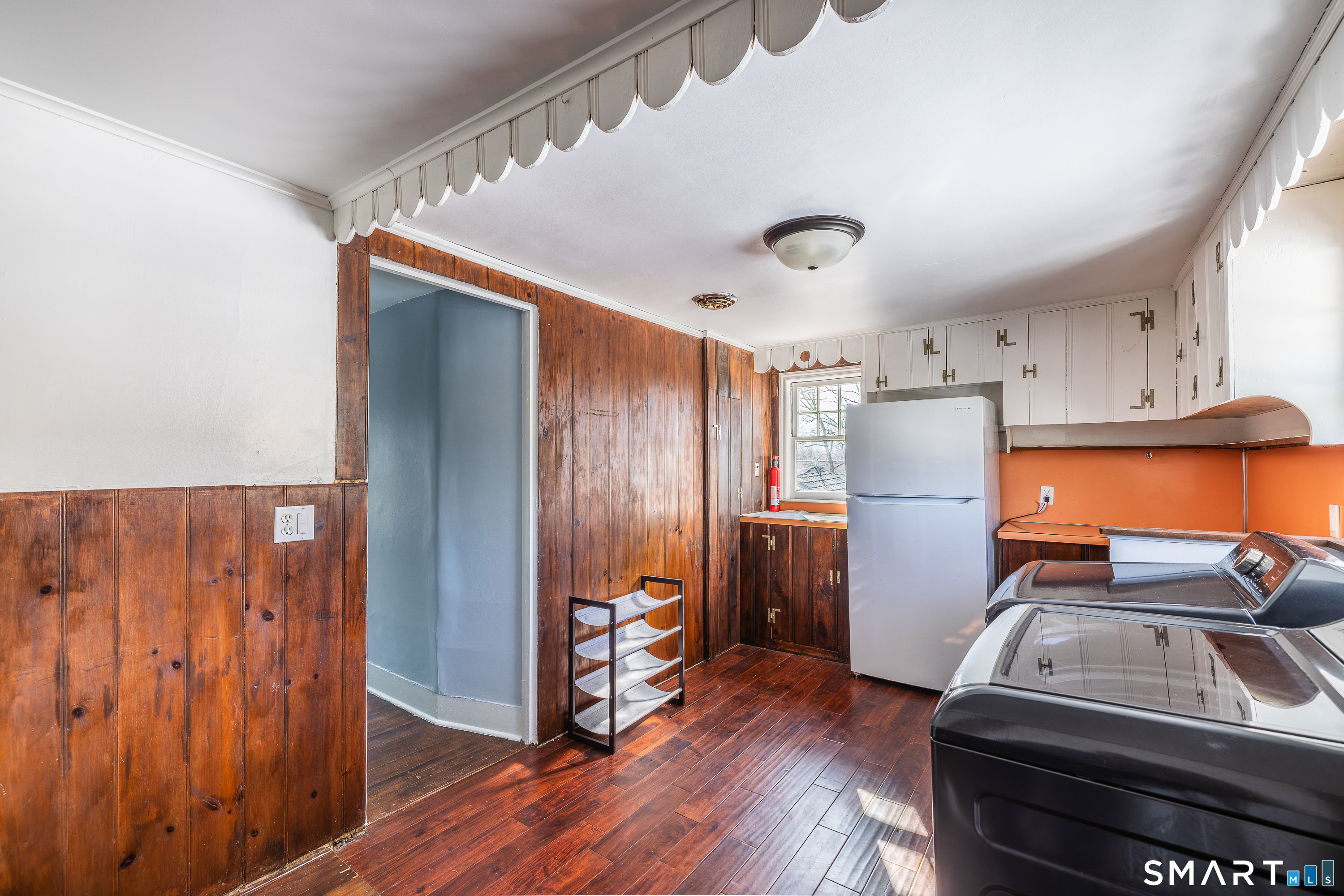 5385 Main Street Trumbull, CT 06611 - Photo 19 of 39 a kitchen with stainless steel appliances a refrigerator and a stove