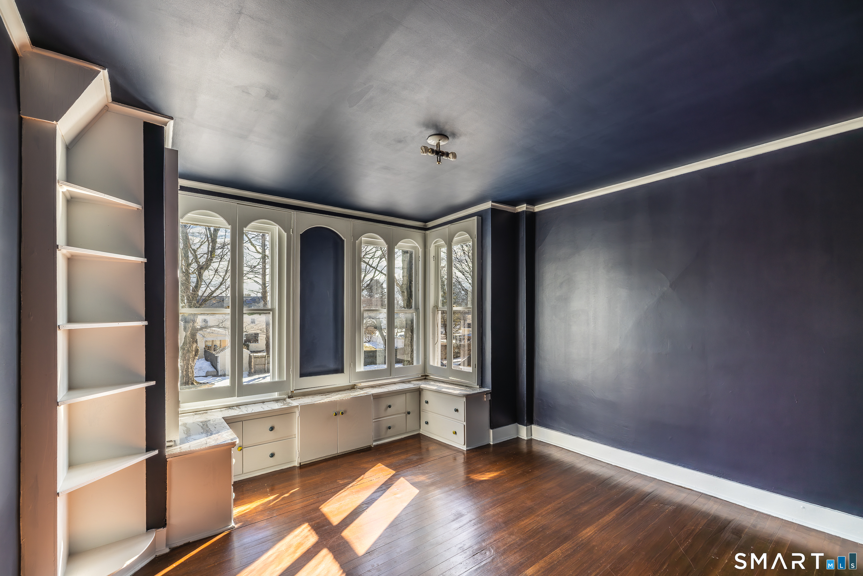 5385 Main Street Trumbull, CT 06611 - Photo 20 of 39 wooden floor in an empty room with a window