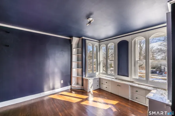 an empty room with windows