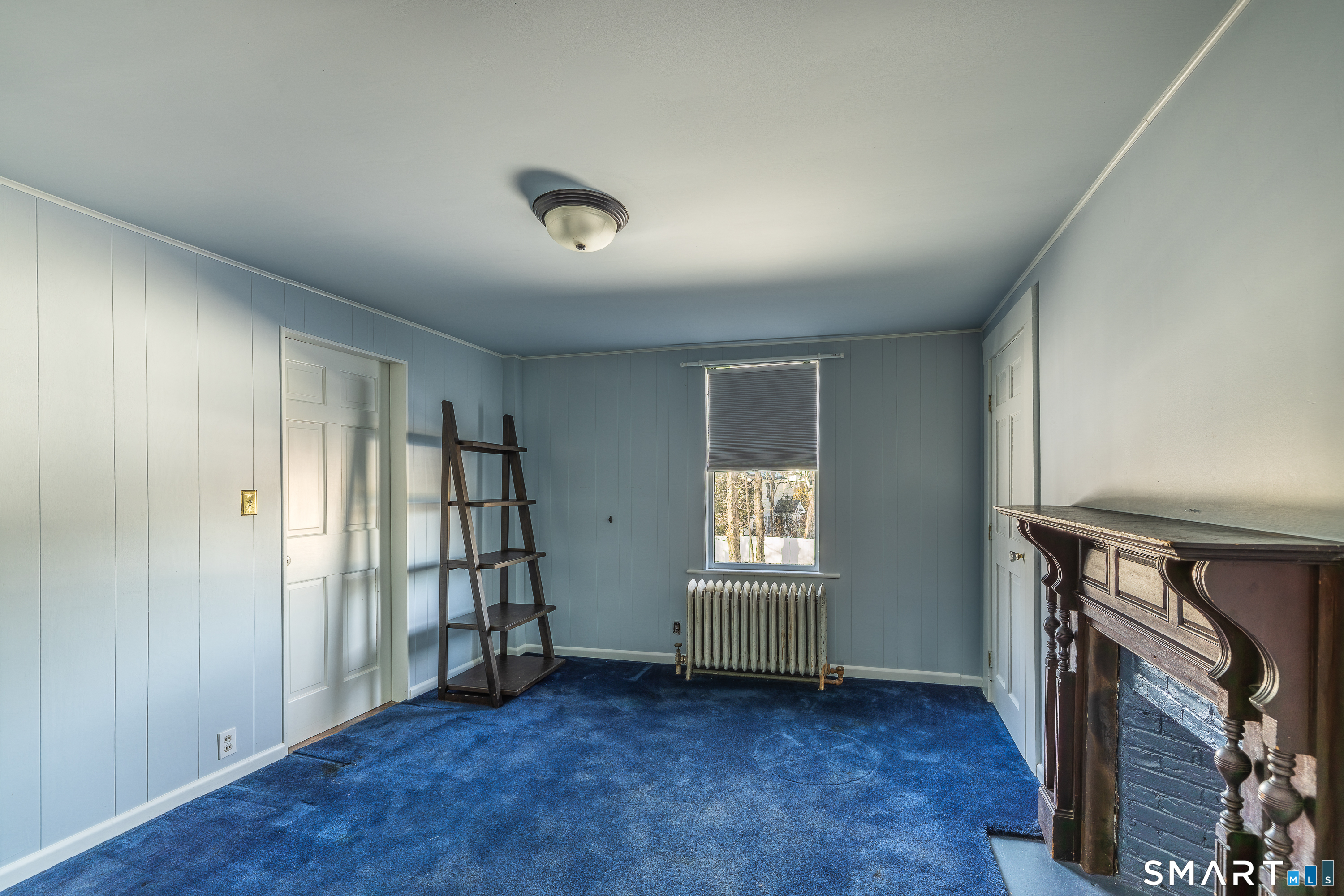 5385 Main Street Trumbull, CT 06611 - Photo 25 of 39 a view of an empty room with a window and a livingroom