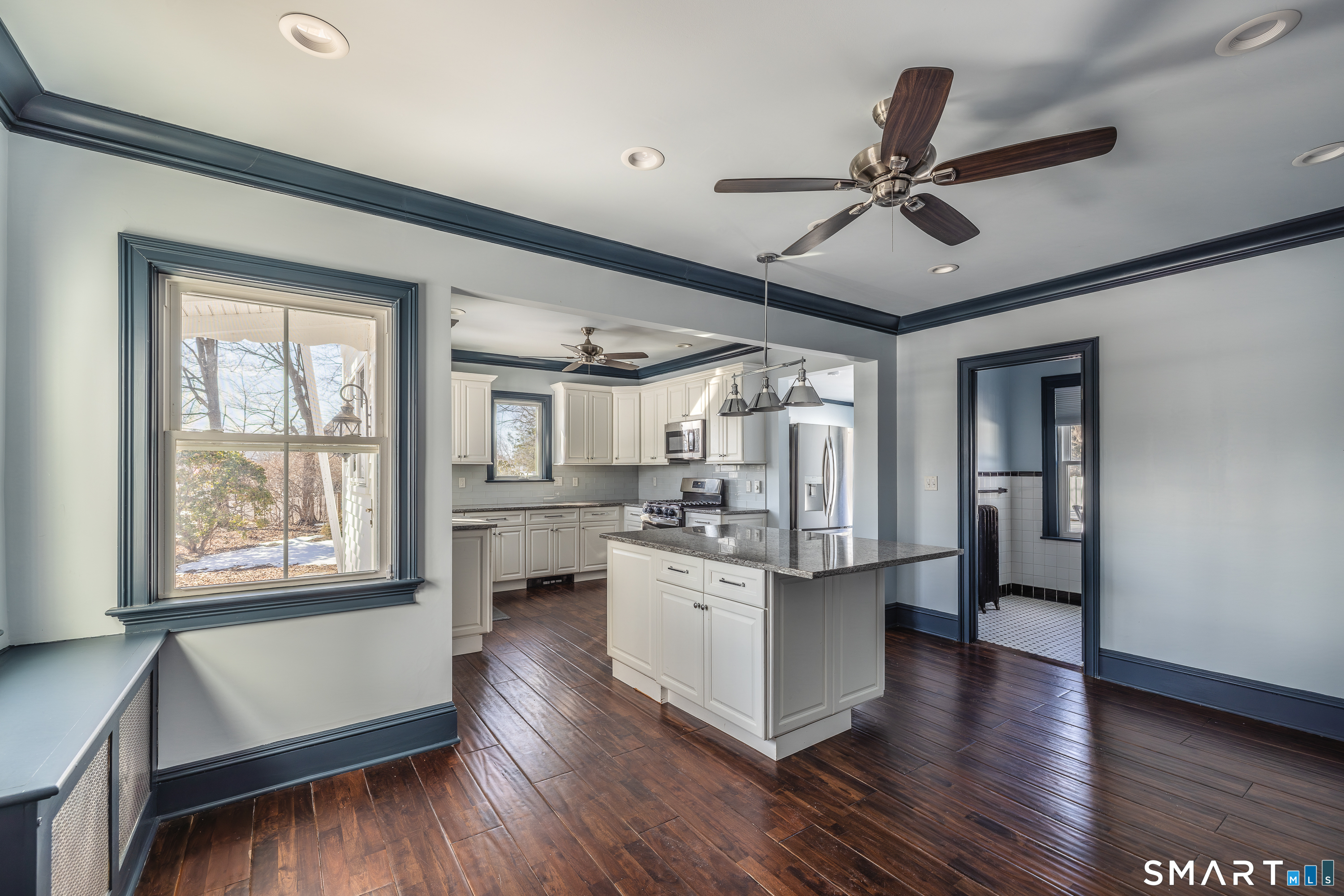 5385 Main Street Trumbull, CT 06611 - Photo 4 of 39 a kitchen with a stove a sink and a refrigerator