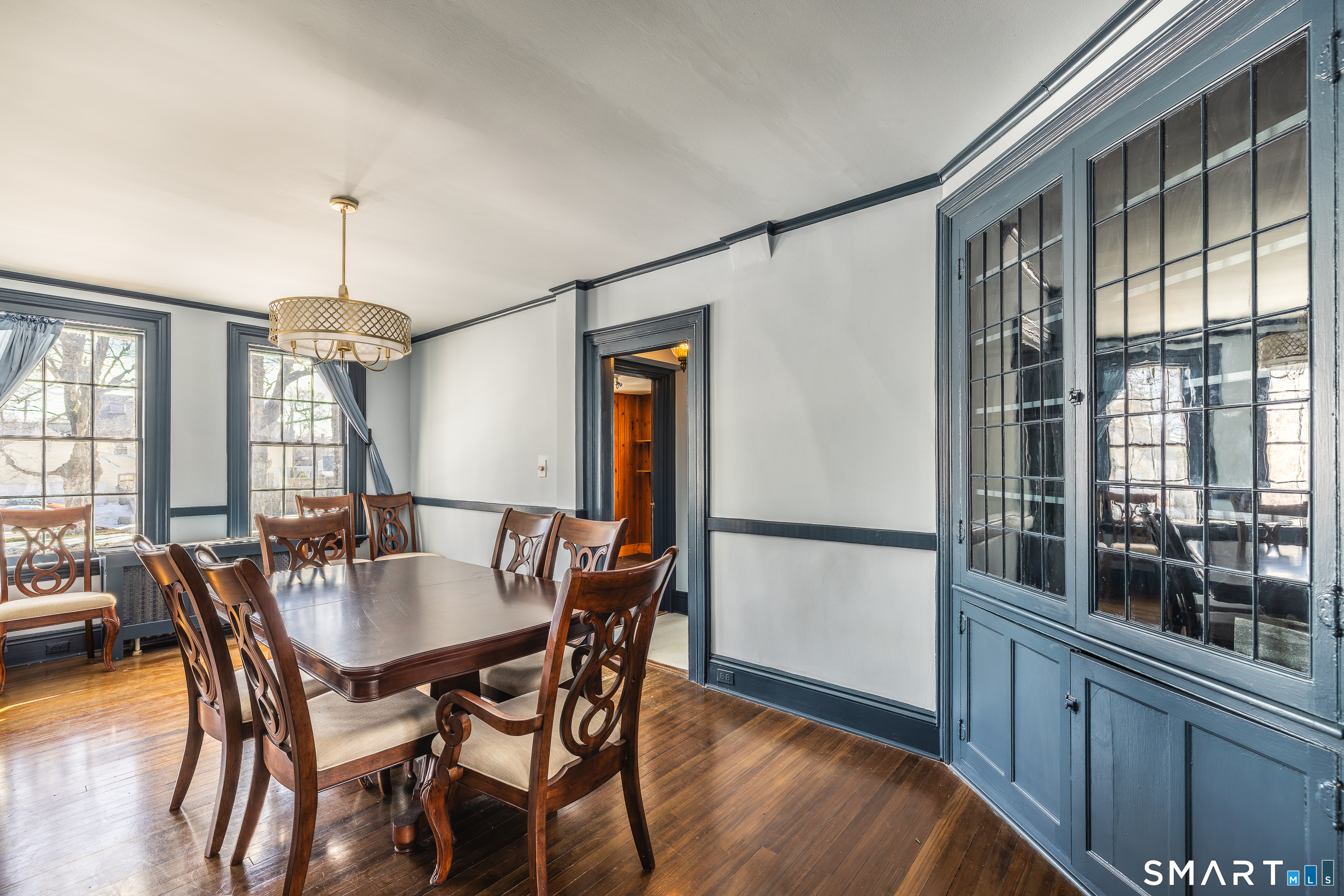 5385 Main Street Trumbull, CT 06611 - Photo 8 of 39 a dining room with furniture window and wooden floor