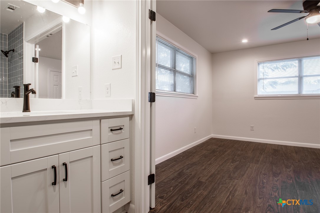 2019 South 9th Street Temple, TX 76504 - Photo 16 of 23 Primary bath looking out to primary bedroom