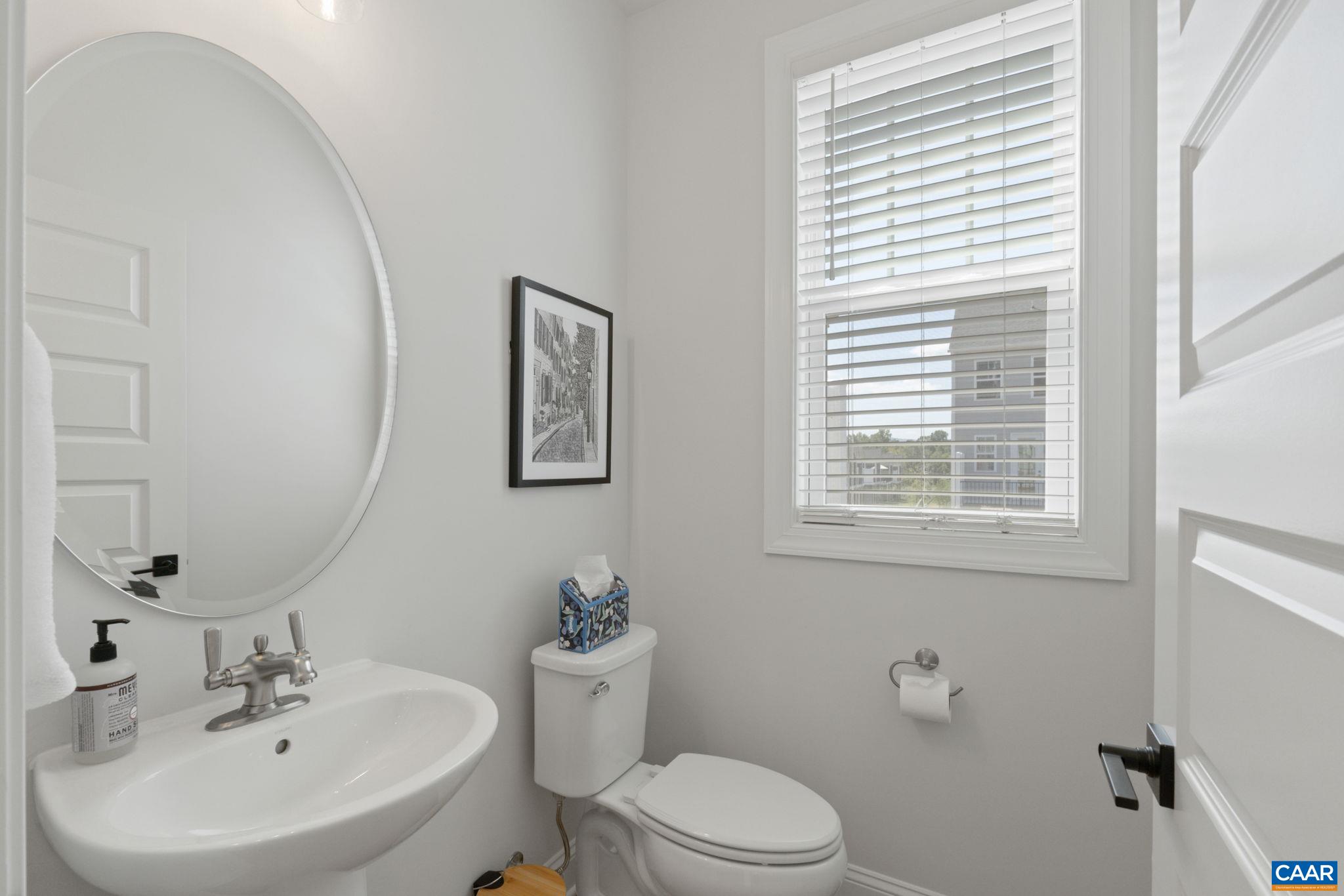 5012 Lindley Place Charlottesville, VA 22901 - Photo 14 of 39 a bathroom with a sink mirror and toilet