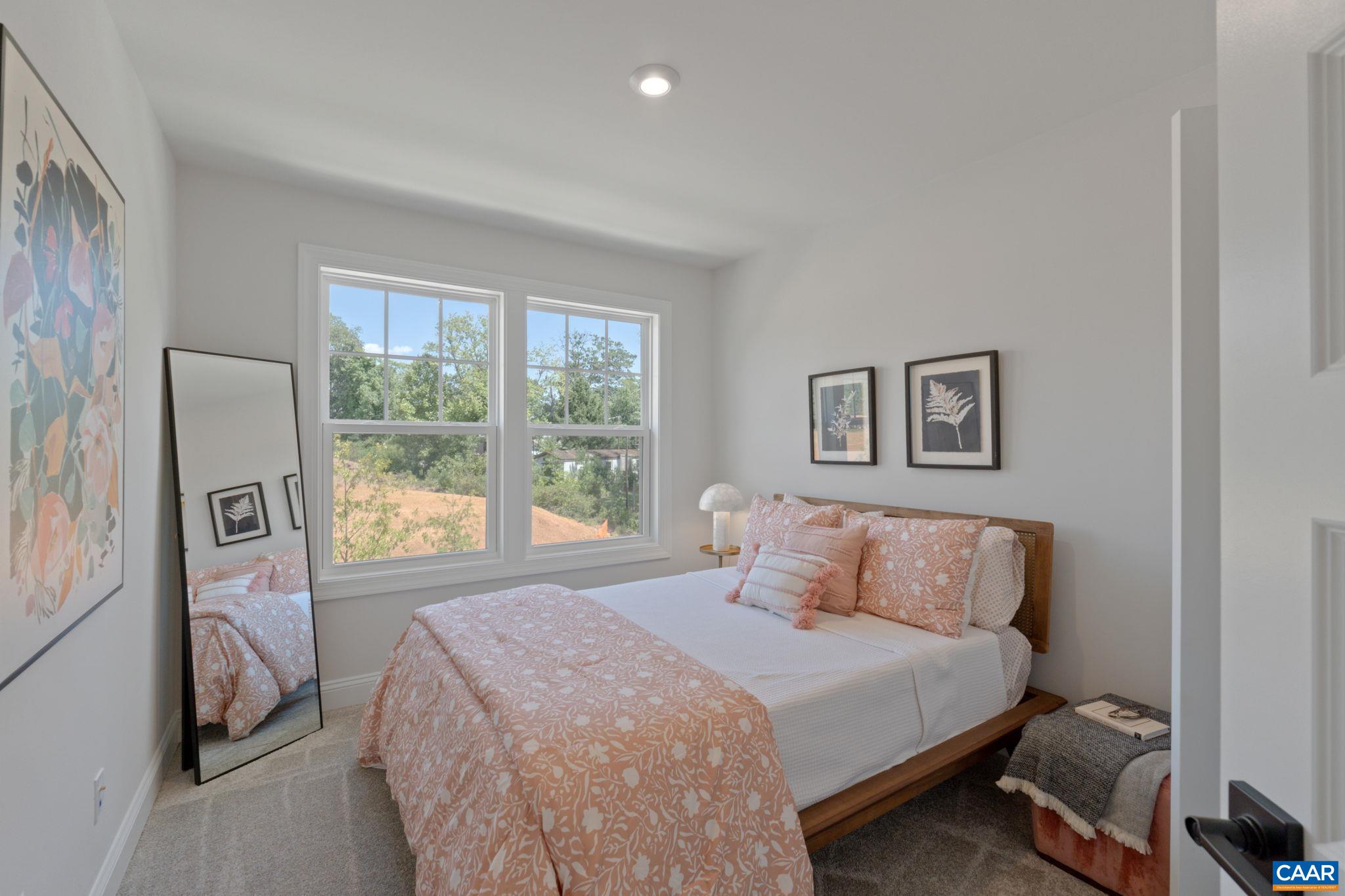 5012 Lindley Place Charlottesville, VA 22901 - Photo 25 of 39 a bedroom with a large bed and a window