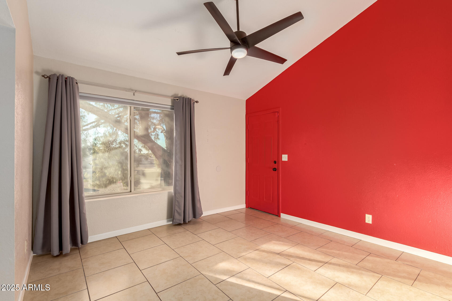 19601 North 7th Street, Unit 1063 Phoenix, AZ 85024 - Photo 12 of 26 a view of a livingroom with a ceiling fan and window