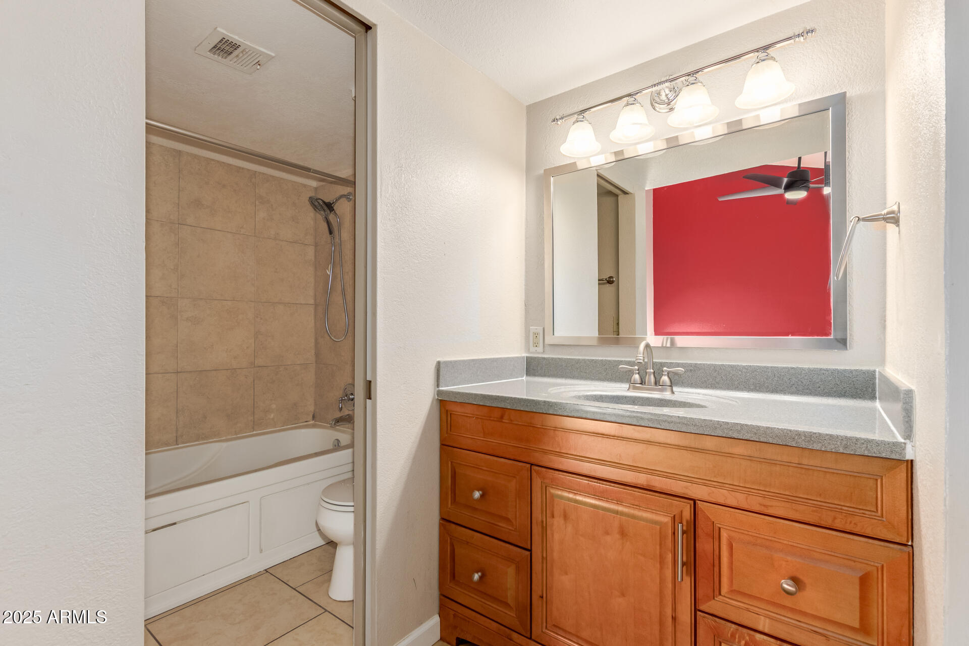 19601 North 7th Street, Unit 1063 Phoenix, AZ 85024 - Photo 14 of 26 a bathroom with a granite countertop sink mirror and vanity