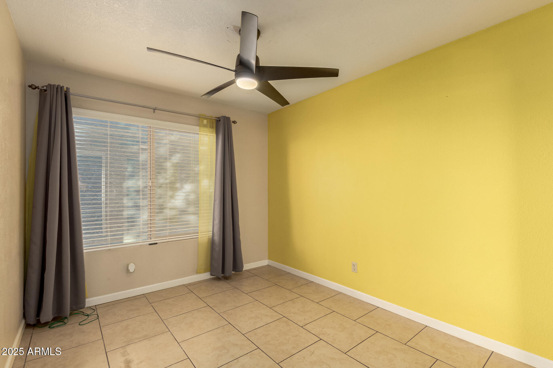 19601 North 7th Street, Unit 1063 Phoenix, AZ 85024 - Photo 16 of 26 a view of an empty room with a window