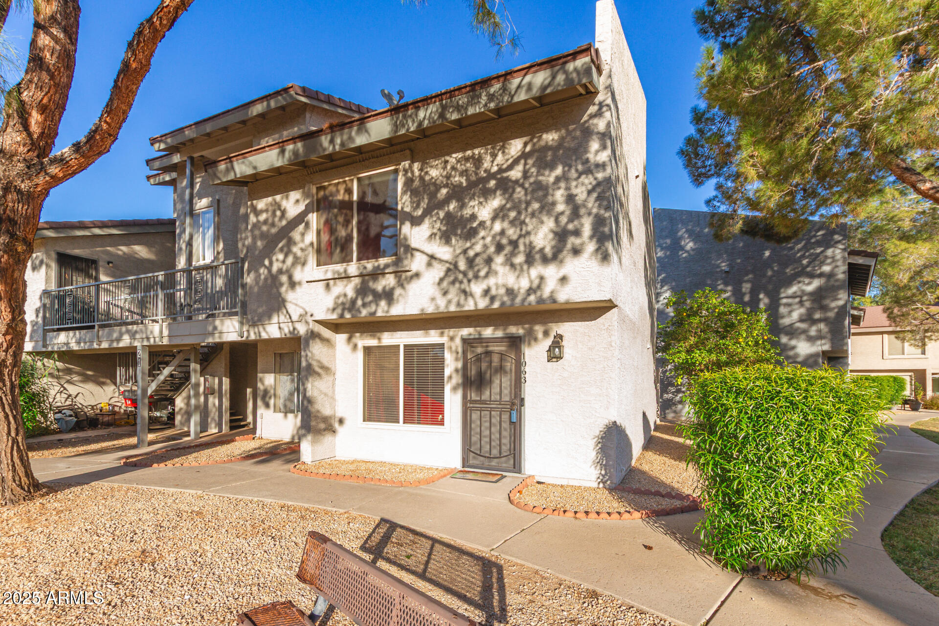 19601 North 7th Street, Unit 1063 Phoenix, AZ 85024 - Photo 2 of 26 a view of a house with a yard