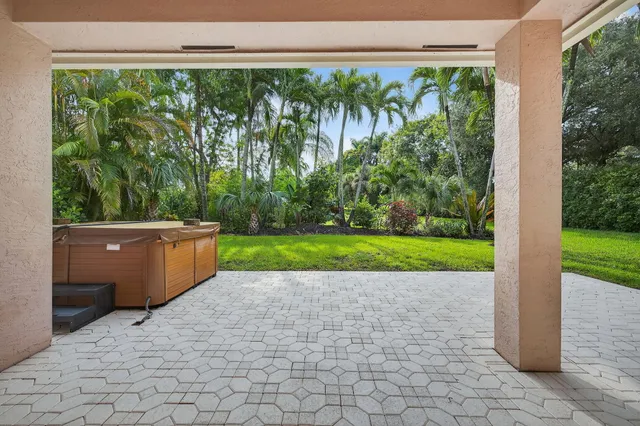 a view of a room with a garden and trees