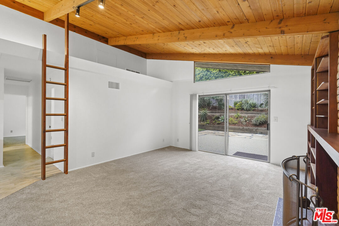 Sea Star Drive Malibu, CA 90265 - Photo 18 of 33 a view of livingroom with furniture and floor to ceiling window