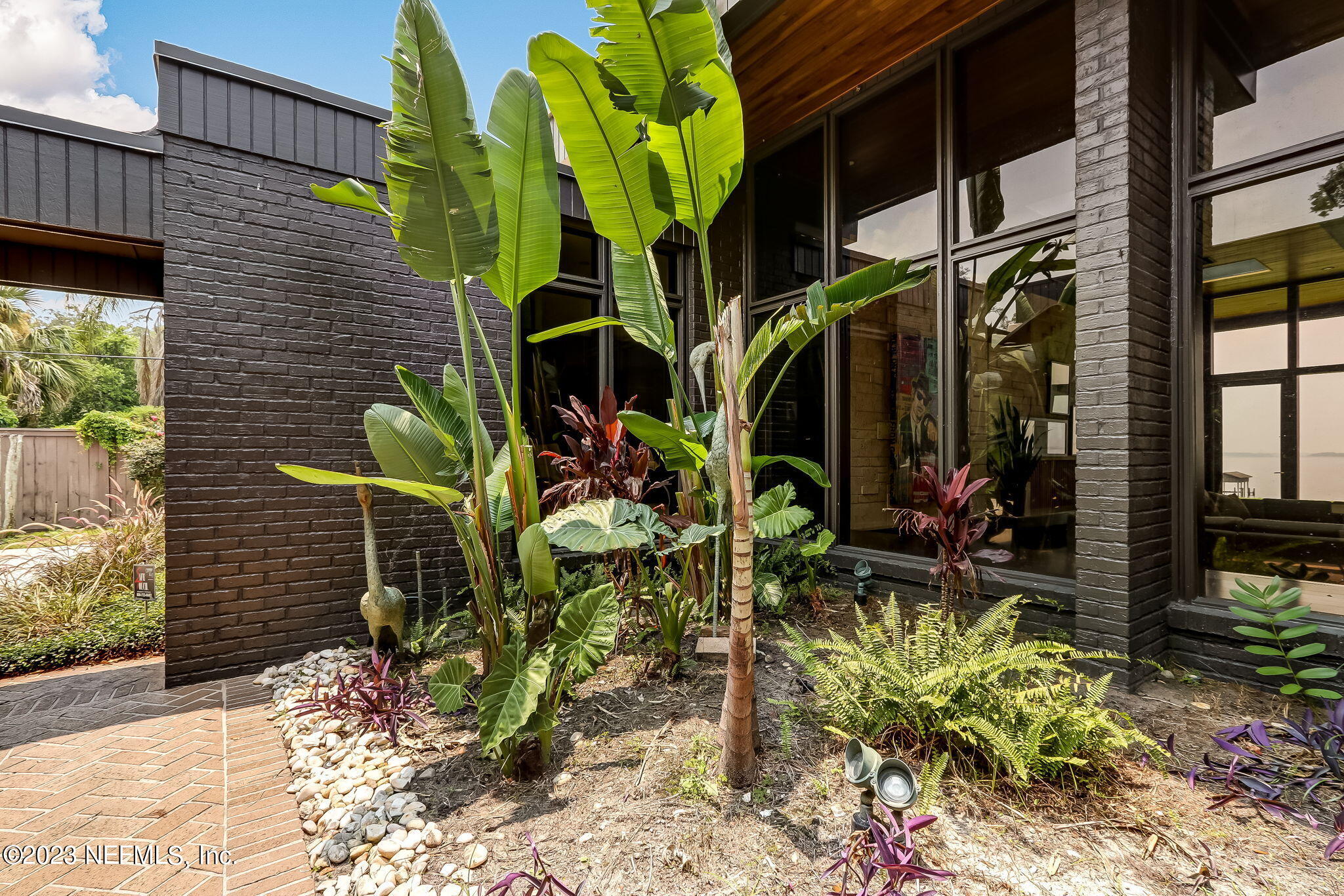 3215 Front Road Jacksonville, FL 32257 - Photo 57 of 76 a view of a potted plant in front of a house