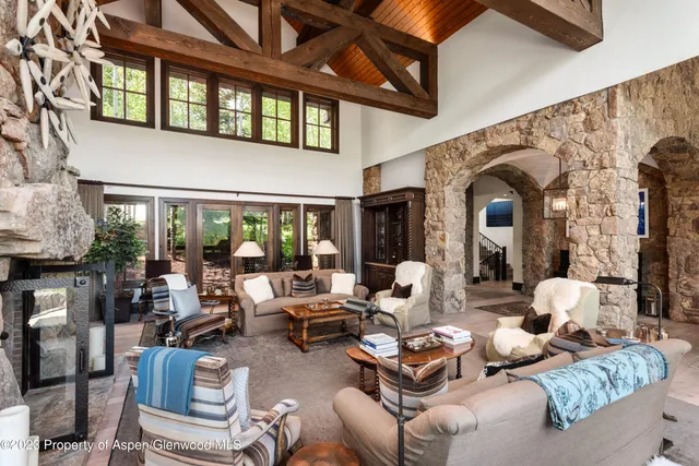 a view of a patio with a table and chairs
