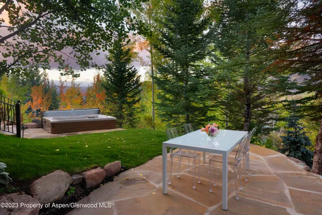 a view of outdoor sitting area with furniture