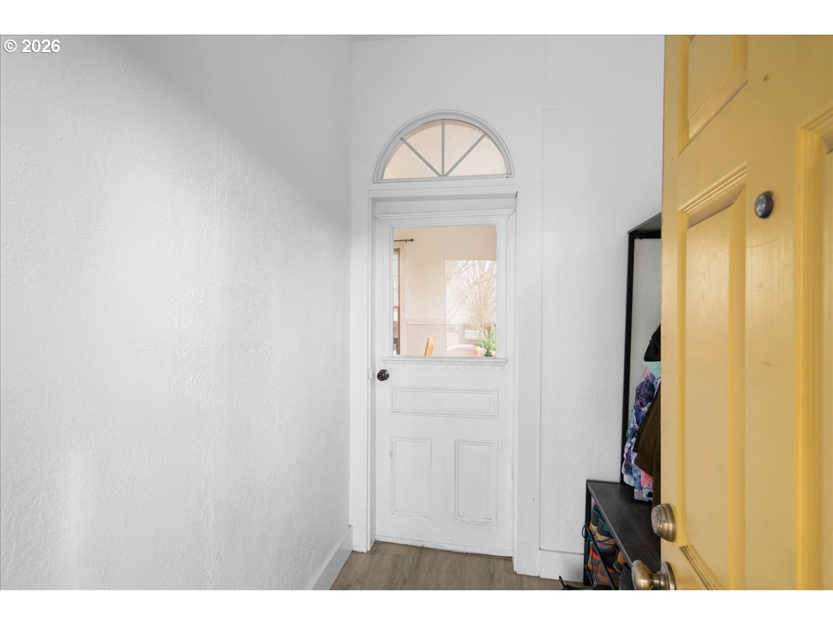 1280 4th Street Northeast Salem, OR 97301 - Photo 6 of 44 a view of front door with wooden door