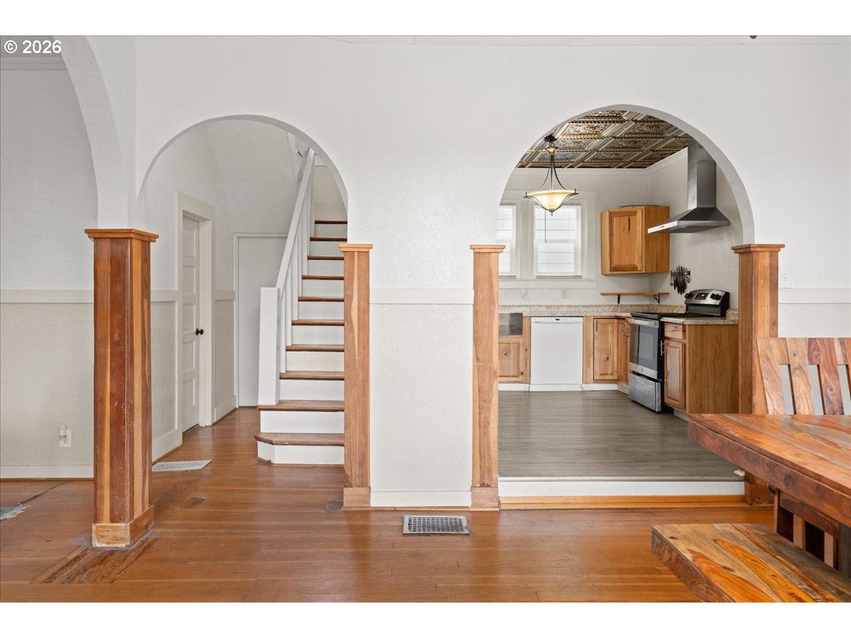 1280 4th Street Northeast Salem, OR 97301 - Photo 10 of 44 a view of a living room with wooden floor and furniture