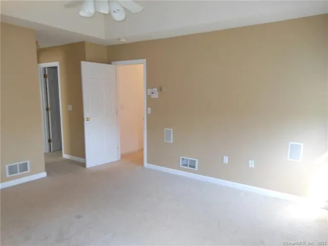 a kitchen with a sink a stove and cabinets