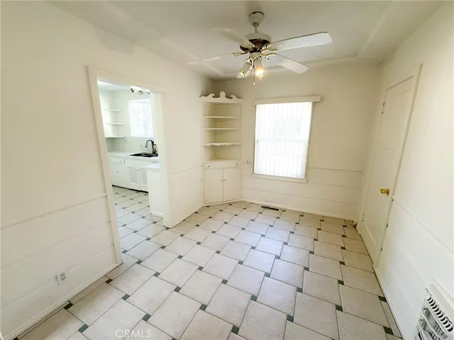 a bathroom with a sink a mirror and shower