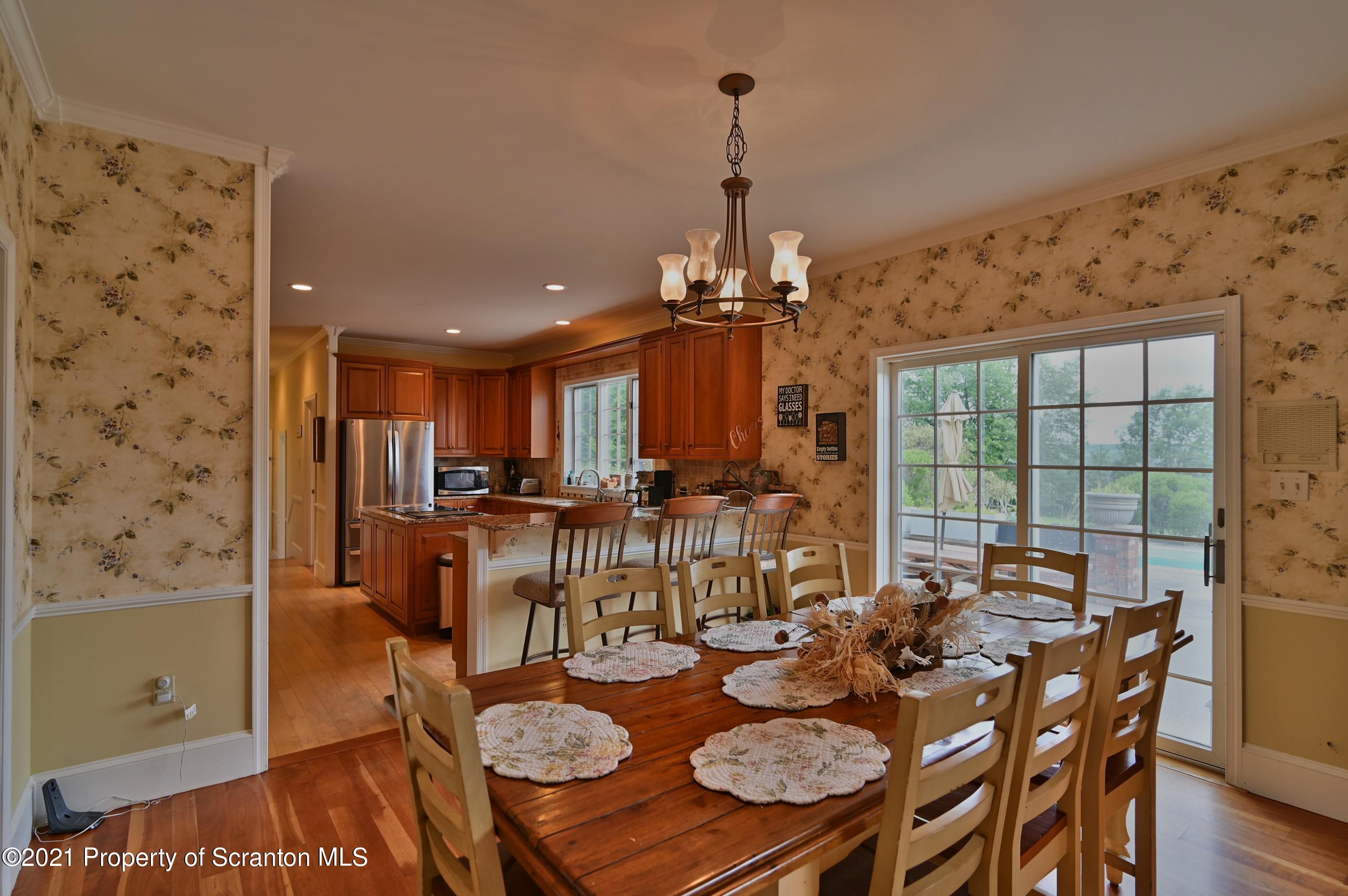 454 Twin Rocks Road Sterling, PA 18463 - Photo 29 of 102 a view of a dining room with furniture window and outside view