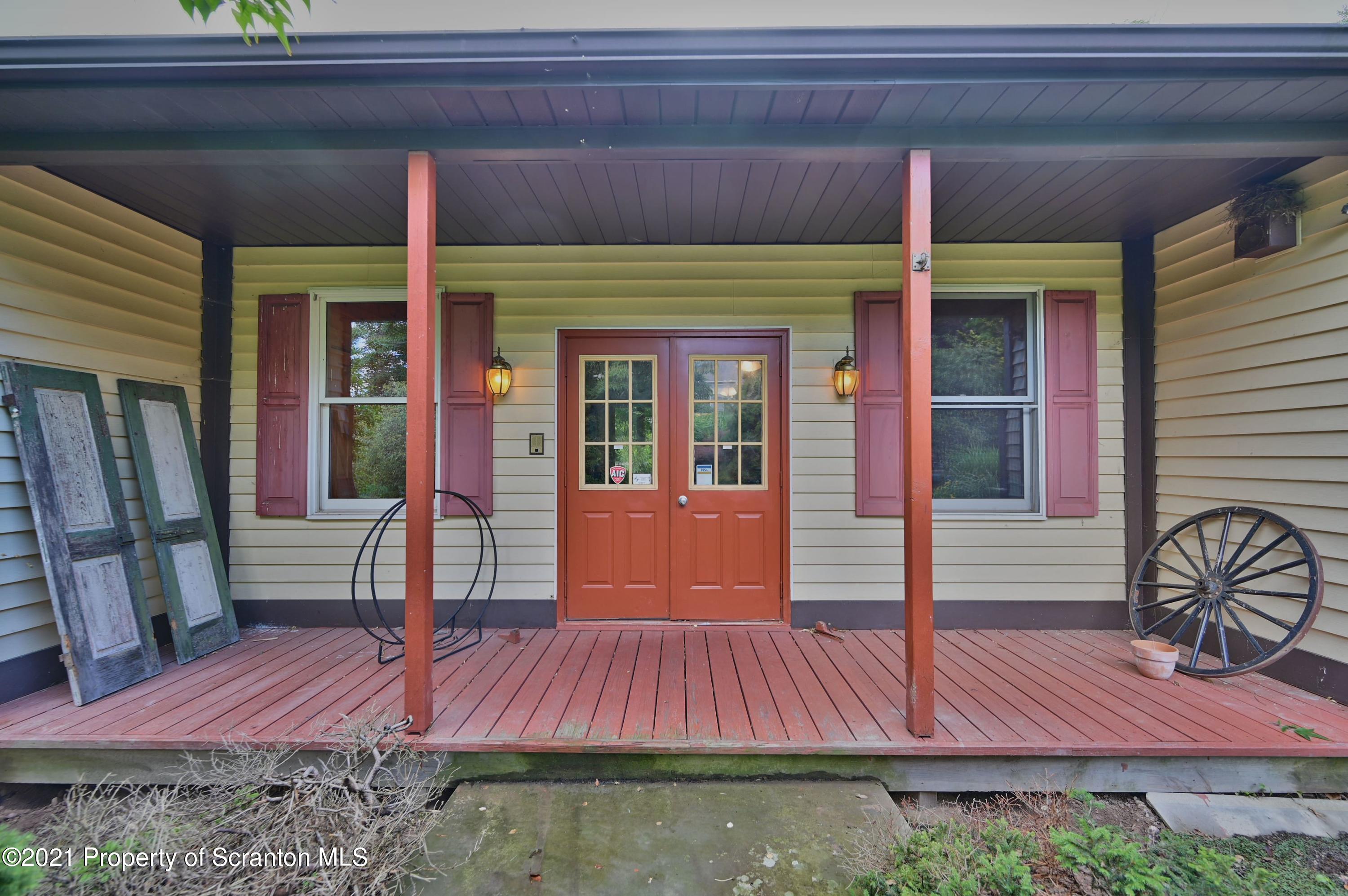 454 Twin Rocks Road Sterling, PA 18463 - Photo 66 of 102 a view of front door of house with yard