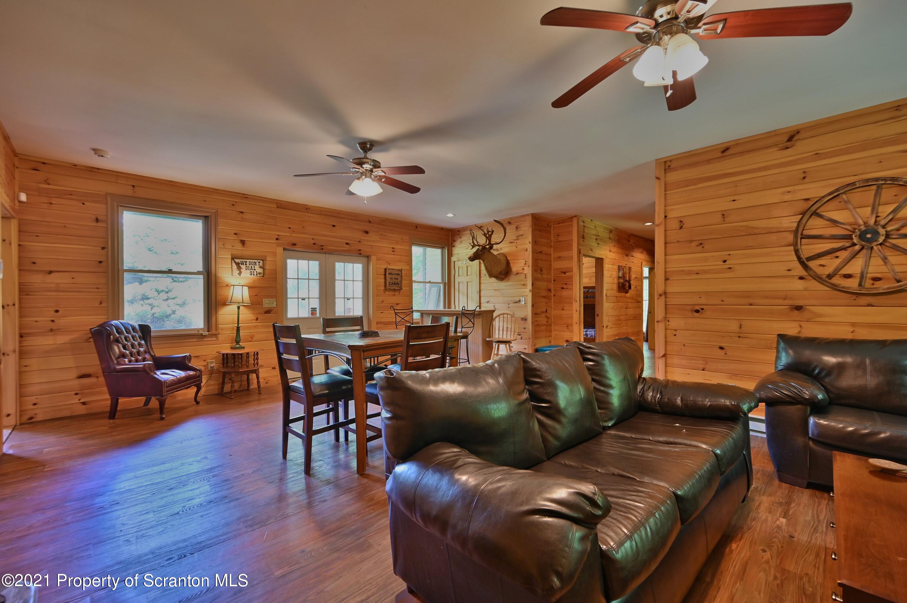 454 Twin Rocks Road Sterling, PA 18463 - Photo 71 of 102 a living room with furniture and a window