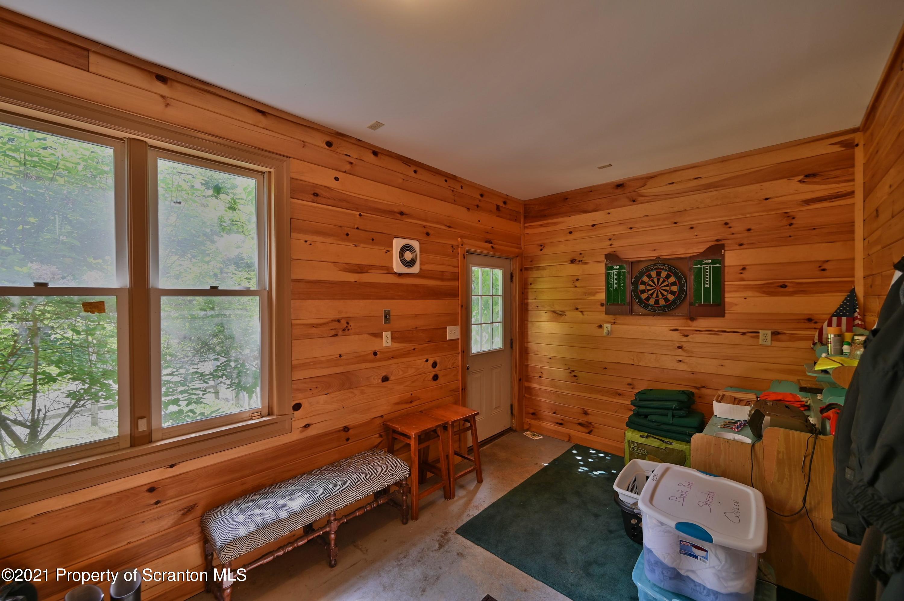 454 Twin Rocks Road Sterling, PA 18463 - Photo 76 of 102 a room with furniture and a window
