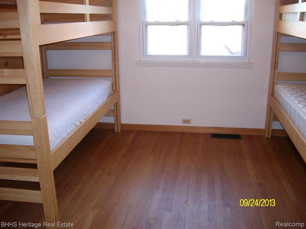 2881 East Cohoctah Road Howell, MI 48855 - Photo 14 of 16 2881 HARDWOOD BEDROOM 2.jpg