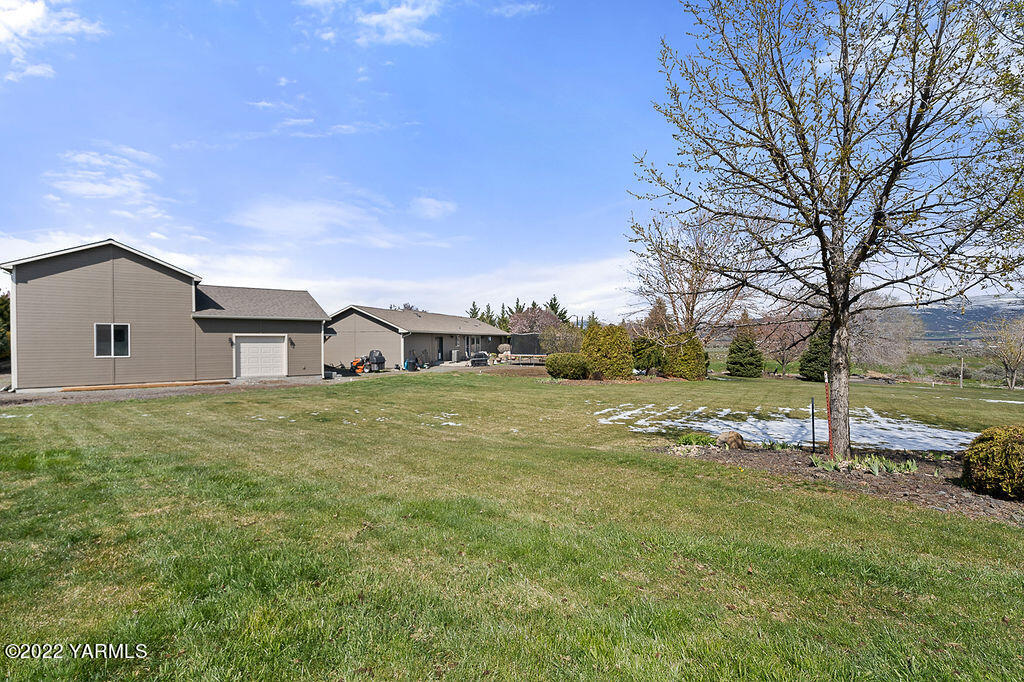 15773 Fisk Road Yakima, WA 98908 - Photo 42 of 50 a view of a house with a yard