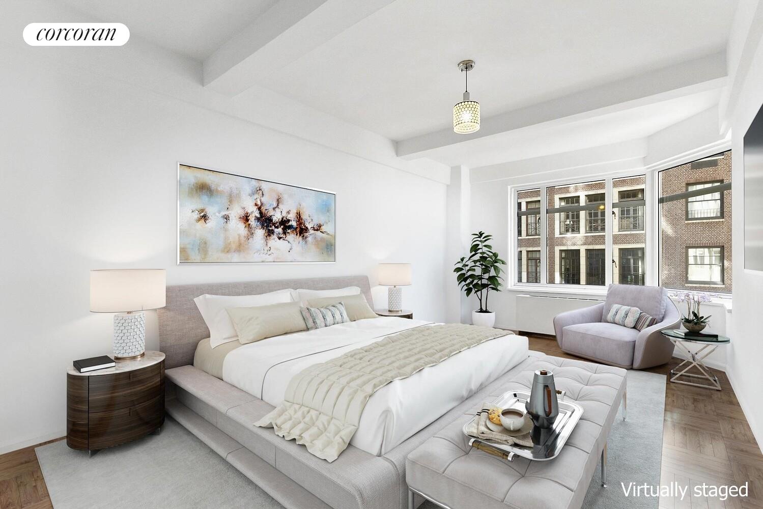 65 East 76th Street, Unit 2C Manhattan, NY 10021 - Photo 2 of 7 a bed room with a bed and a couch