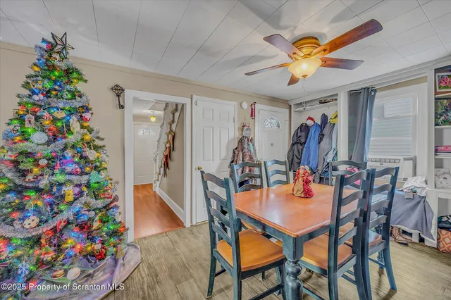 a view of a dining room with furniture