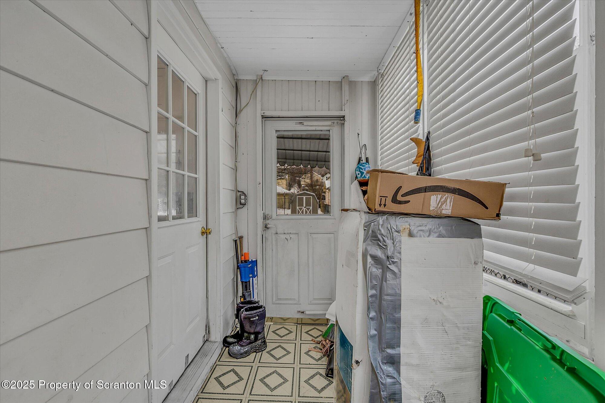 219 1st Street Olyphant, PA 18447 - Photo 29 of 43 a view of an entryway with staircase