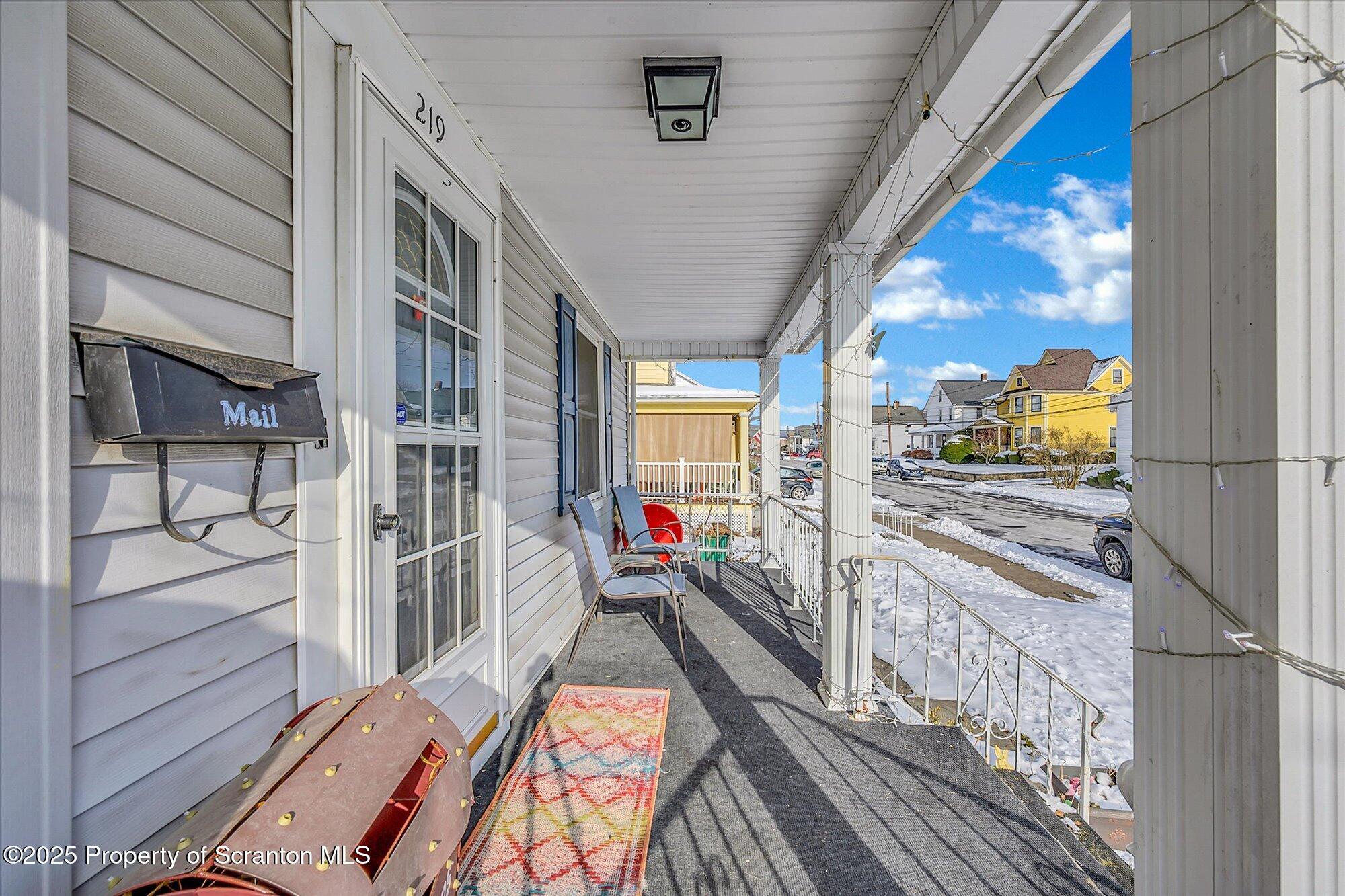 219 1st Street Olyphant, PA 18447 - Photo 7 of 43 a room with furniture
