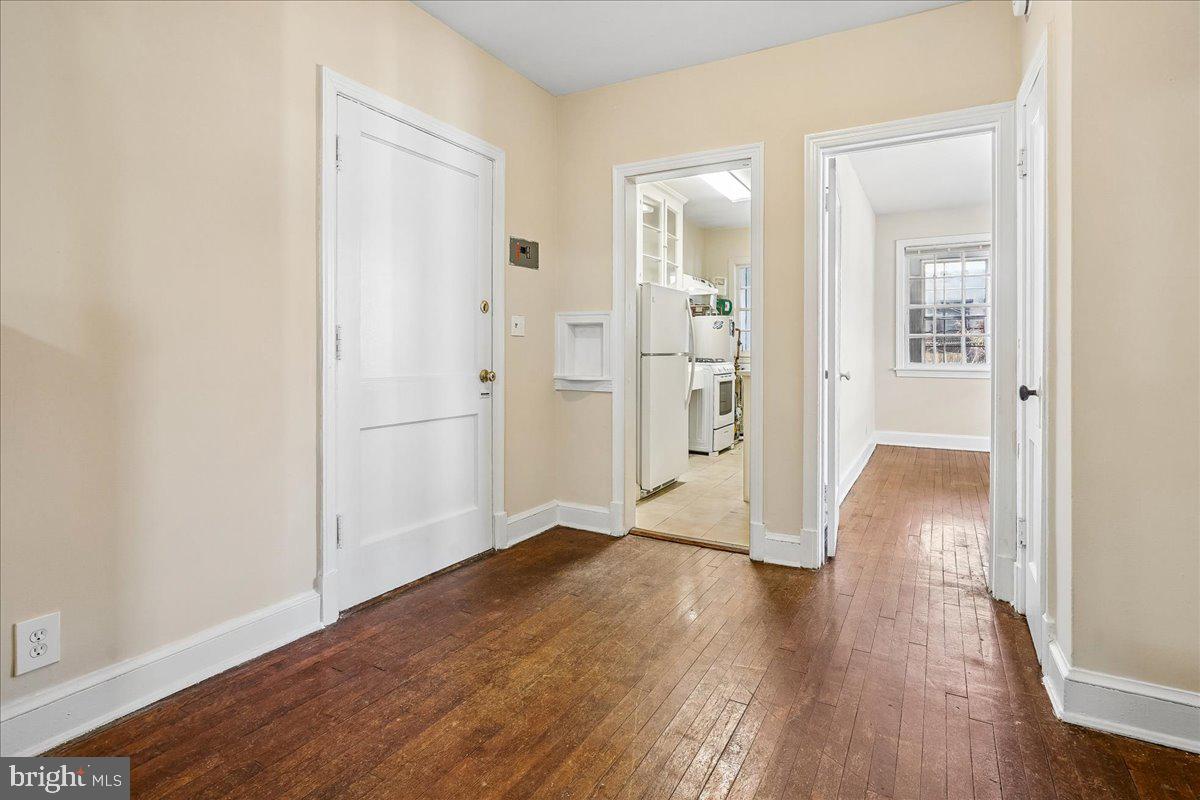 3944 7th Street Northeast, Unit 4 Washington, DC 20017 - Photo 3 of 19 wooden floor in a empty room