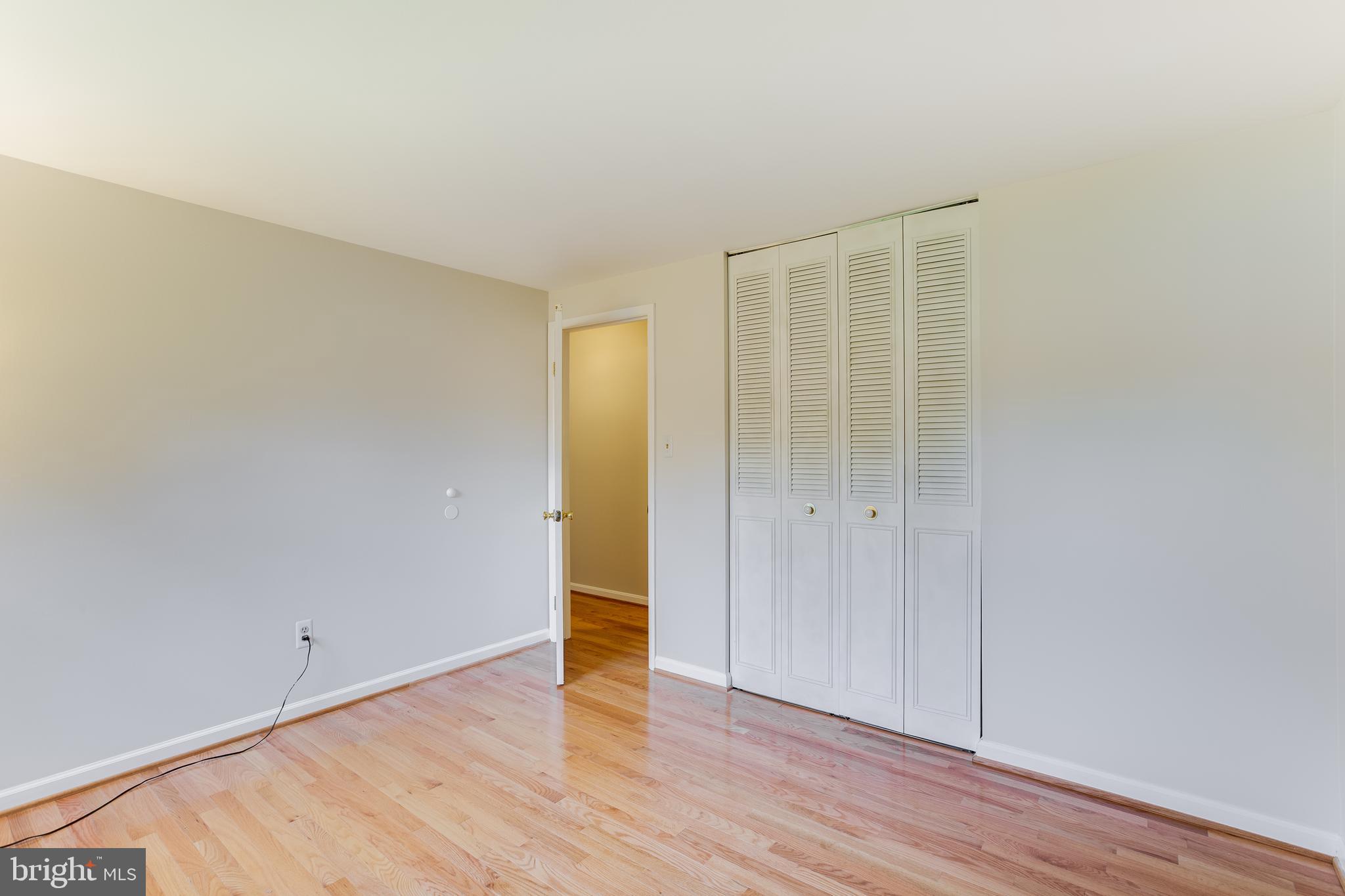 19064 Staleybridge Road Germantown, MD 20876 - Photo 15 of 37 Primary Bedroom Louvered closet doors